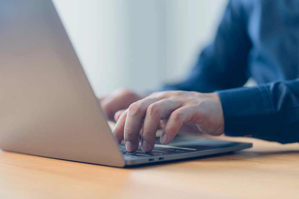 Man entrepreneur use laptop computer working at home