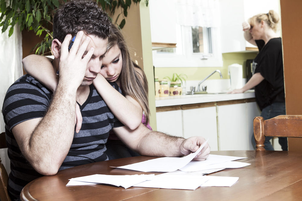 Men with financial stress at home